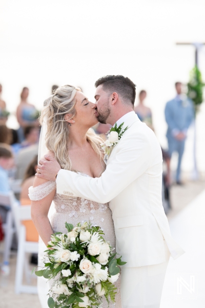 Bride and groom kiss