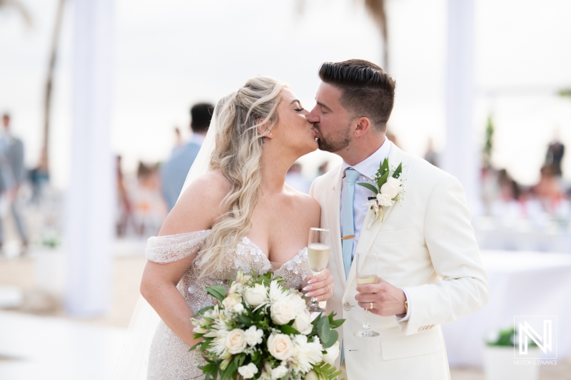 Bride and groom kiss