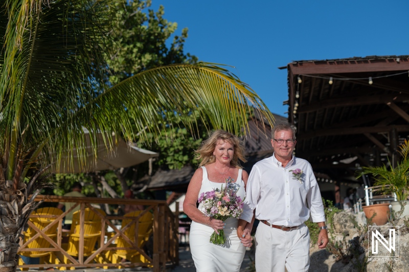 Celebrating love and unity in Curacao at Playa Porto Mari during a beautiful wedding ceremony