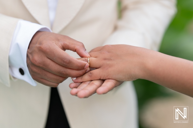 Celebrating love during a beautiful wedding ceremony in Curacao with the exchanging of rings