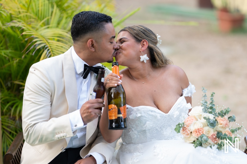 Couple celebrates their love during a stunning wedding in Curacao with tropical backdrop and joyful atmosphere