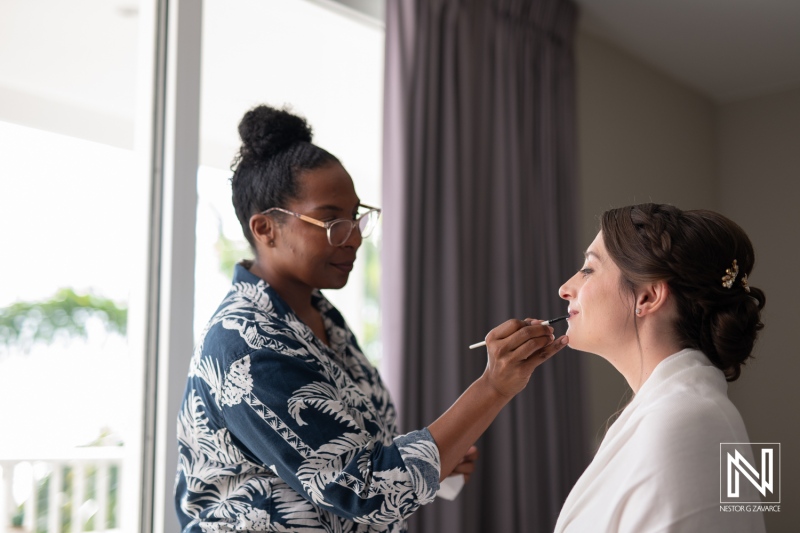 Bridal makeup preparation at Avila Beach Hotel in Curacao for a romantic wedding celebration