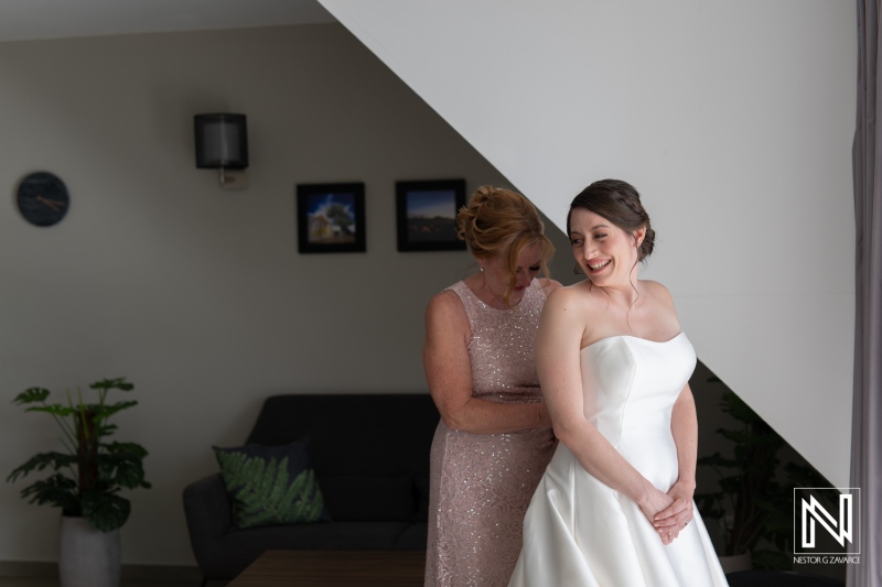 Bridal preparations at Avila Beach Hotel in Curacao with bride and mother moments before the wedding ceremony