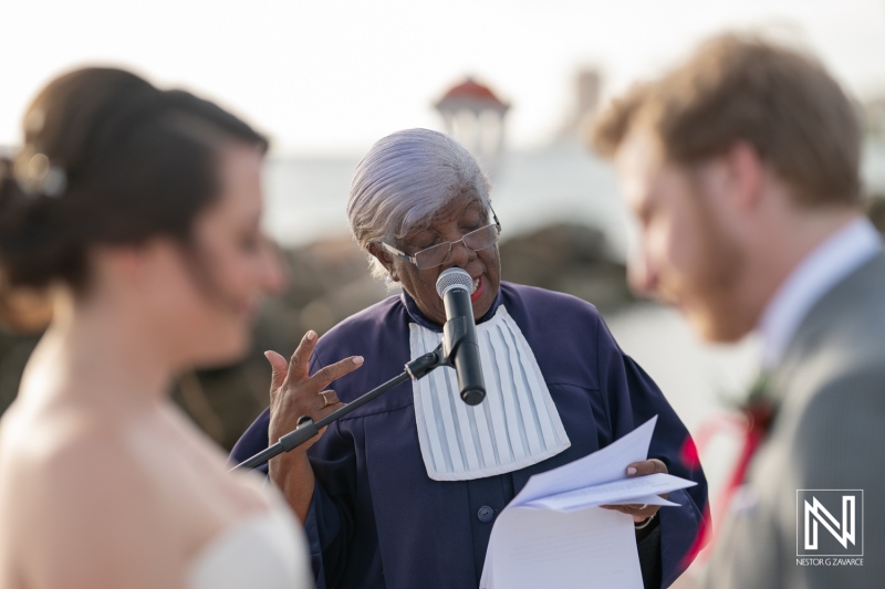 Ceremony at Avila Beach Hotel in Curacao features heartfelt vows and a celebratory atmosphere during a wedding