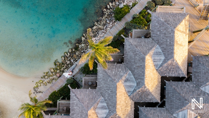 Stunning wedding celebration at Avila Beach Hotel in Curacao surrounded by beautiful ocean and lush greenery
