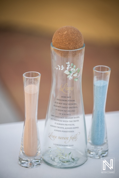 Couple celebrates their wedding at Avila Beach Hotel with a sand ceremony and special unity display