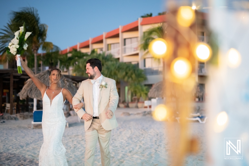 Bride and groom entering the reception