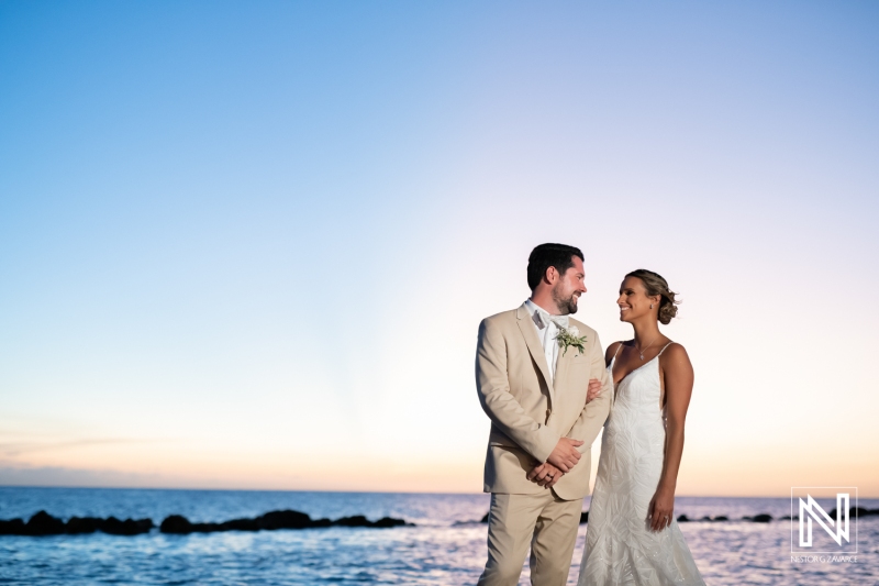 Bride and groom sunset shot