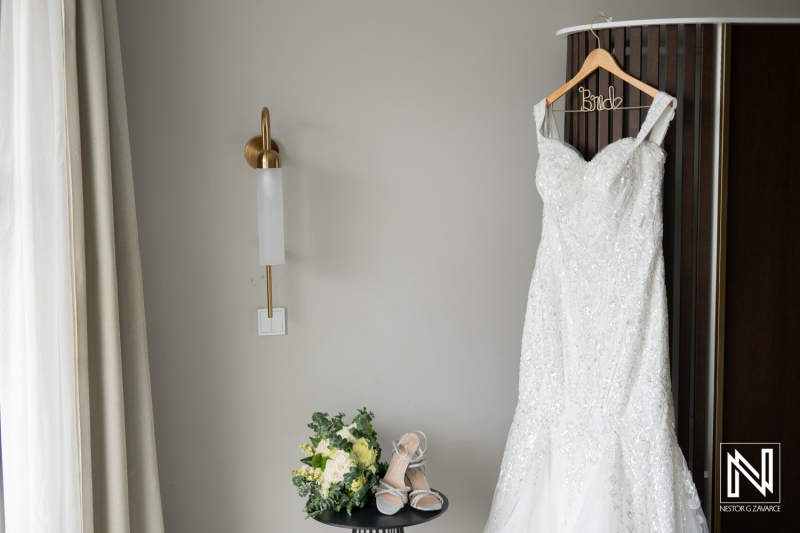 Elegant wedding dress waiting for the bride at Mangrove Beach Corendon in Curacao on a beautiful day