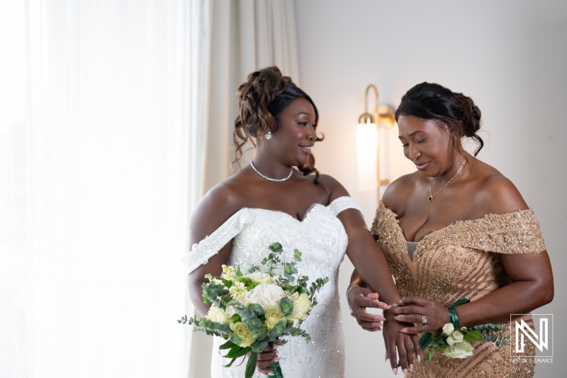 Celebration of love at Mangrove Beach Corendon in Curacao featuring a bride and her mother before the wedding ceremony