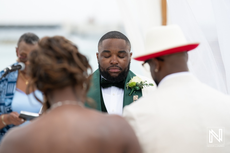 Wedding ceremony at Mangrove Beach Corendon in Curacao amidst beautiful views and intimate moments shared by the couple and their guests