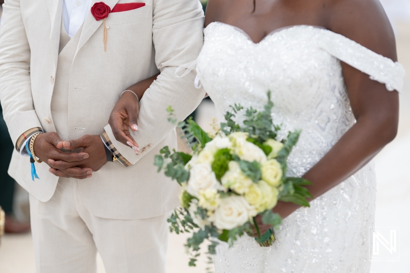 Celebration of love during a wedding ceremony at Mangrove Beach Corendon in Curacao surrounded by beautiful scenery and joyous moments