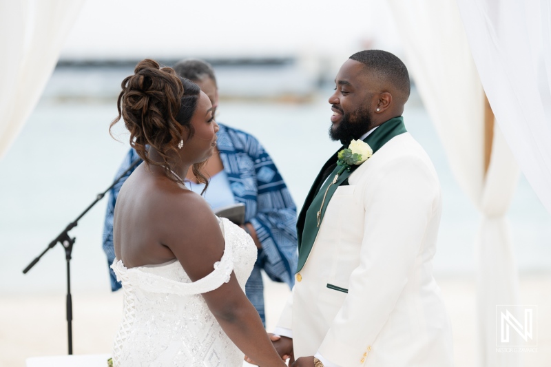Wedding ceremony at Mangrove Beach Corendon in Curacao celebrates love with a heartfelt exchange of vows by a beautiful couple