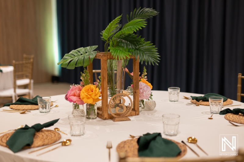 Elegant wedding table setting with floral arrangements and tropical decor at Mangrove Beach Corendon in Curacao