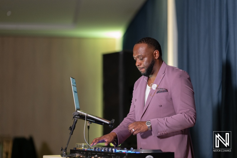 Celebration of love at Mangrove Beach Corendon in Curacao with a DJ setting the perfect ambiance during the wedding reception
