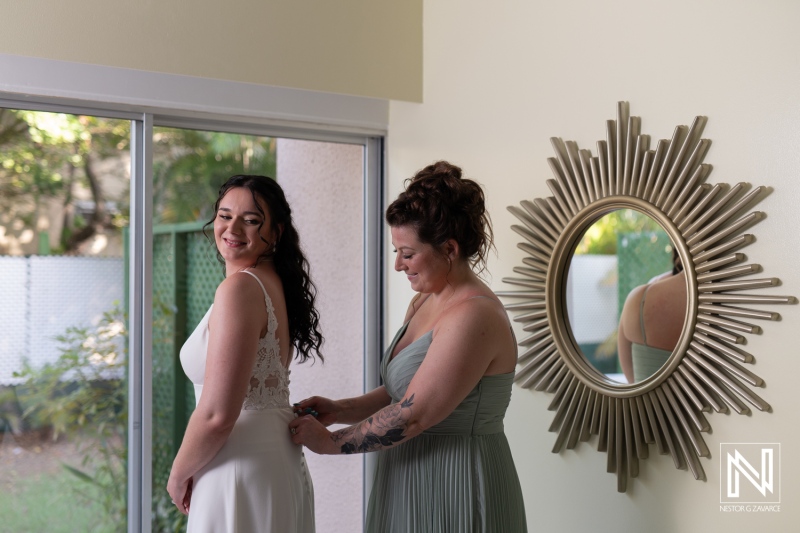 Wedding preparation in Curacao at Sunscape Curacao Resort with bride and bridesmaid before the ceremony