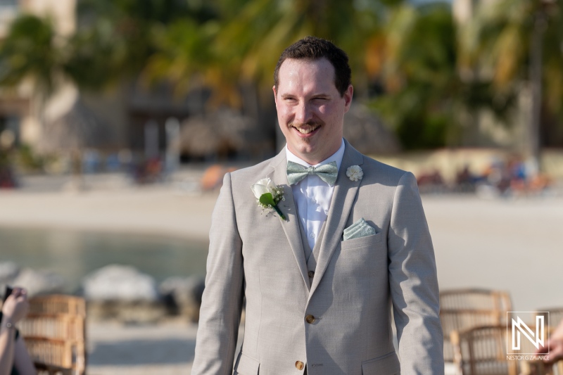Groom smiles during wedding ceremony at Sunscape Curacao Resort showcasing love and joy under the Caribbean sun