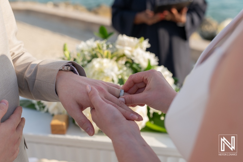 Ceremony at Sunscape Curacao Resort celebrates love with heartfelt vows and ring exchange near the ocean