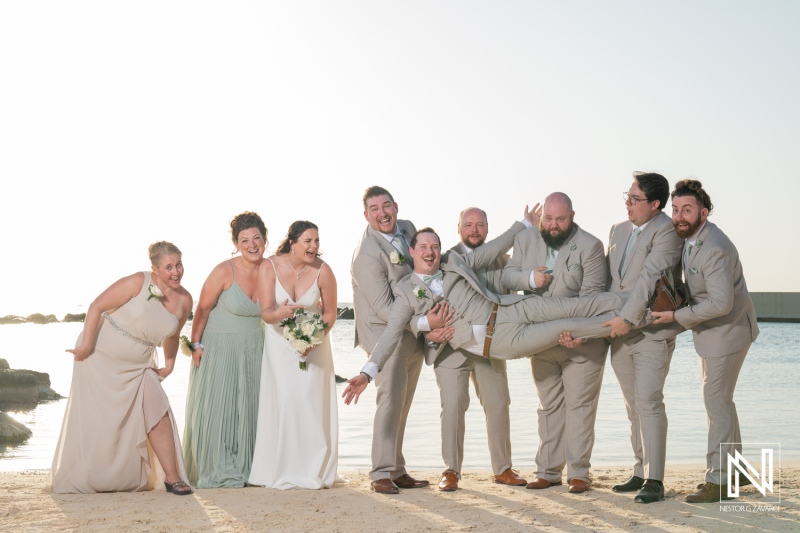 Wedding celebration at Sunscape Curacao Resort with a joyful group of friends enjoying the beautiful shoreline