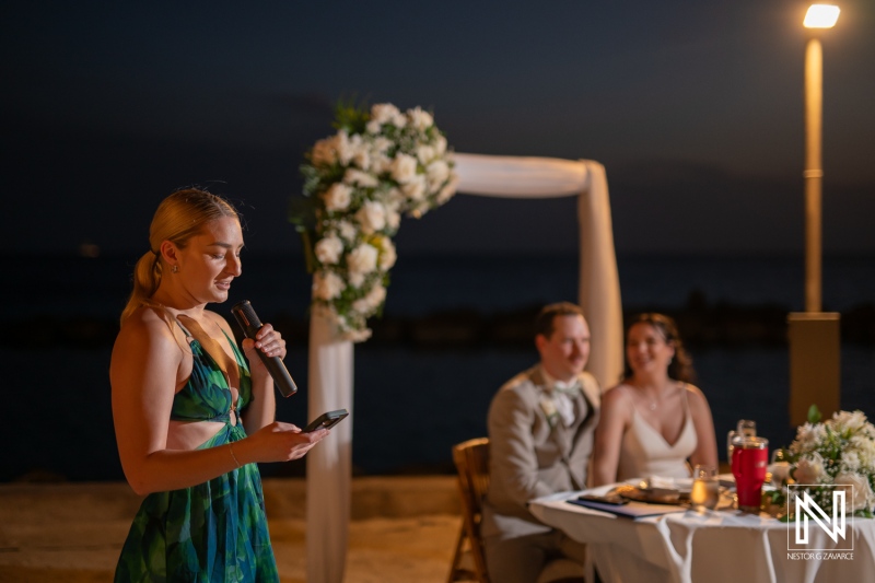Beautiful wedding celebration at Sunscape Curacao Resort with heartfelt speeches and serene ocean backdrop in the evening