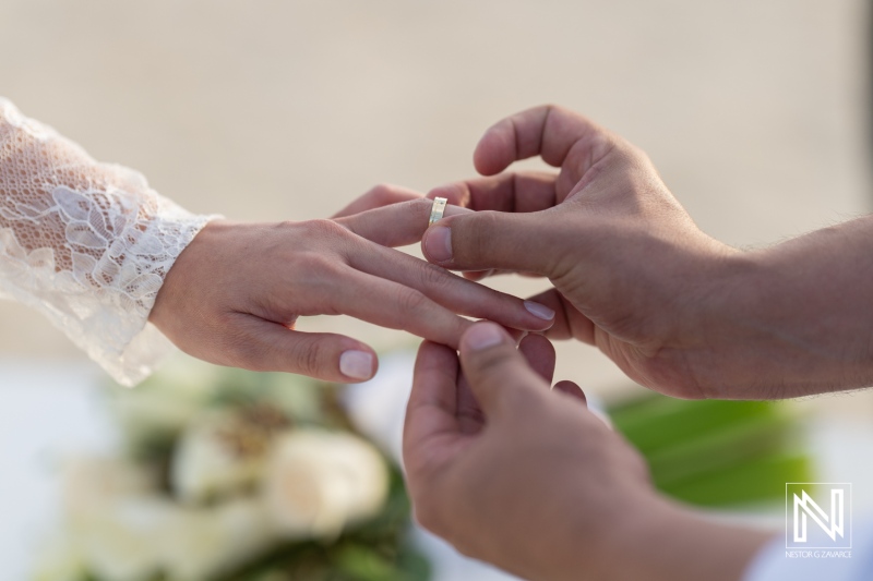 Celebrating love at a beautiful wedding ceremony on Mangrove Beach in Curacao with heartfelt ring exchange