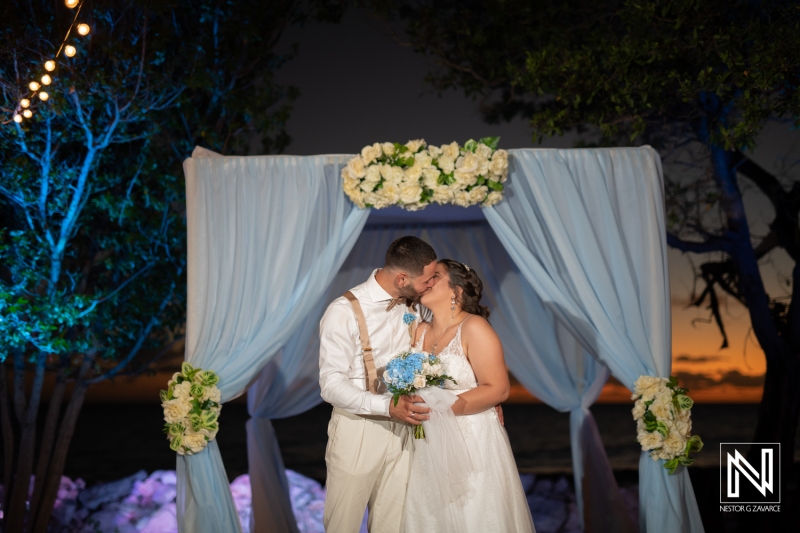 Bride and groom kiss