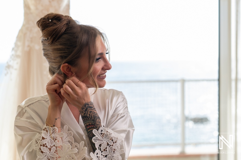 Bride getting ready at Sunscape Curacao Resort for a tropical wedding with ocean views
