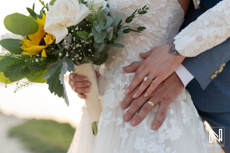 Wedding ceremony at Sunscape Curacao Resort with elegant floral bouquet and exchange of vows