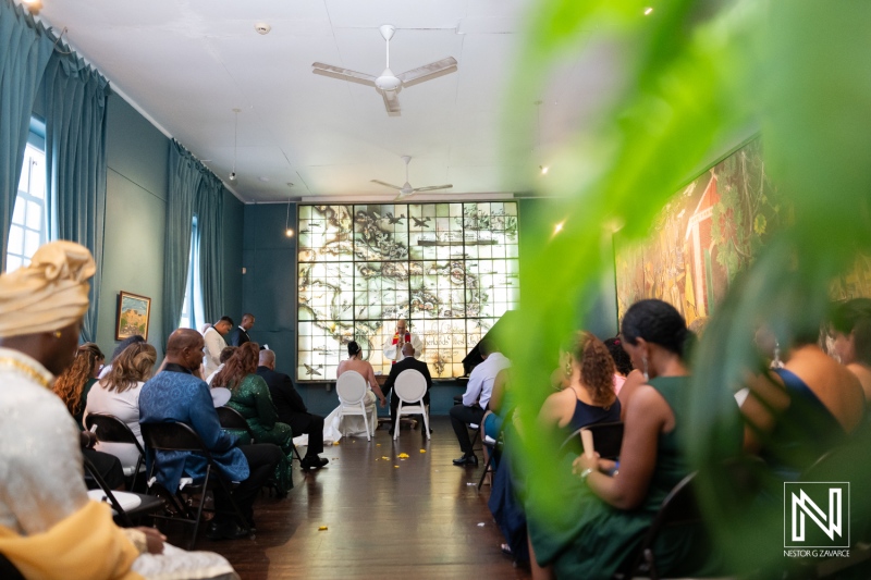 Ceremony at Curaçao Museum celebrates love with family and friends in a charming indoor setting