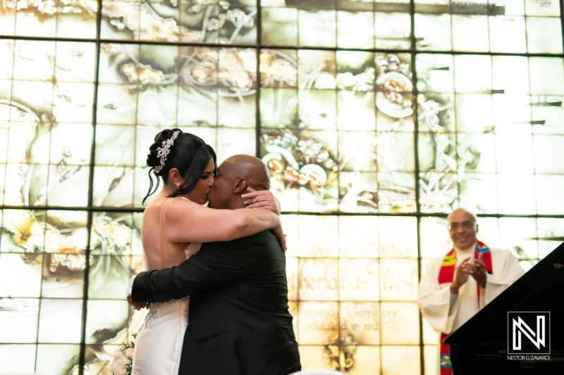 Celebrating love during a wedding ceremony at the Curaçao Museum in Curacao surrounded by art and elegance