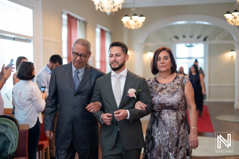 Groom walking down the aisle