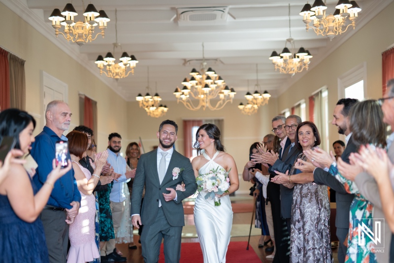 Bride and groom walking at the aisle