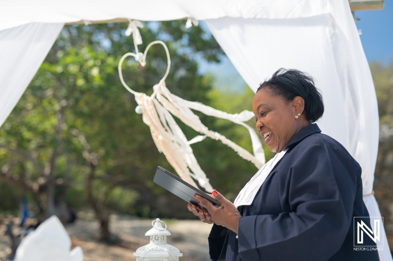 Celebrating love at Daaibooi Beach in Curacao during a beautiful wedding ceremony with heartfelt vows and joyful moments