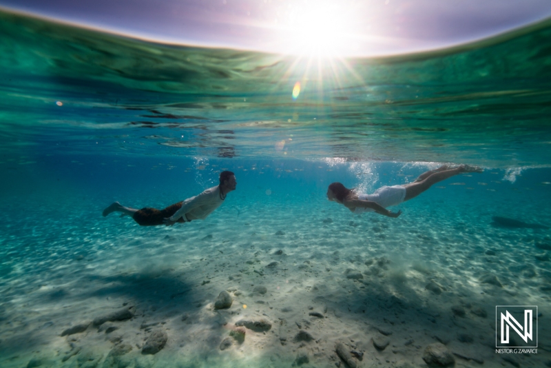 Bride and Groom underwater shot at Cas Abao