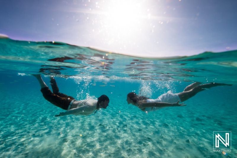 Bride and Groom underwater shot at Cas Abao