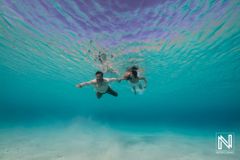 Bride and Groom underwater shot at Cas Abao