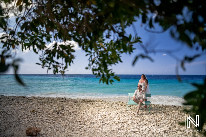 Couple enjoys wedding moment on the beach at Karakter in Curacao on a sunny day