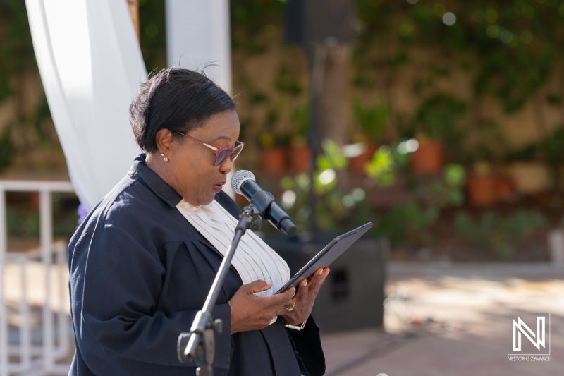 Celebration of love at Avila Beach Hotel in Curacao featuring a heartfelt speech during the wedding ceremony