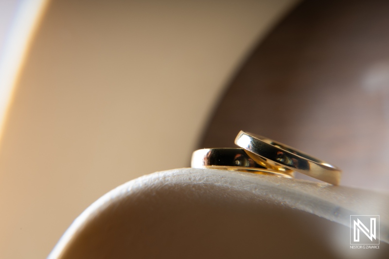 Wedding bands symbolizing love at Renaissance Wind Creek Curacao Resort during a romantic celebration