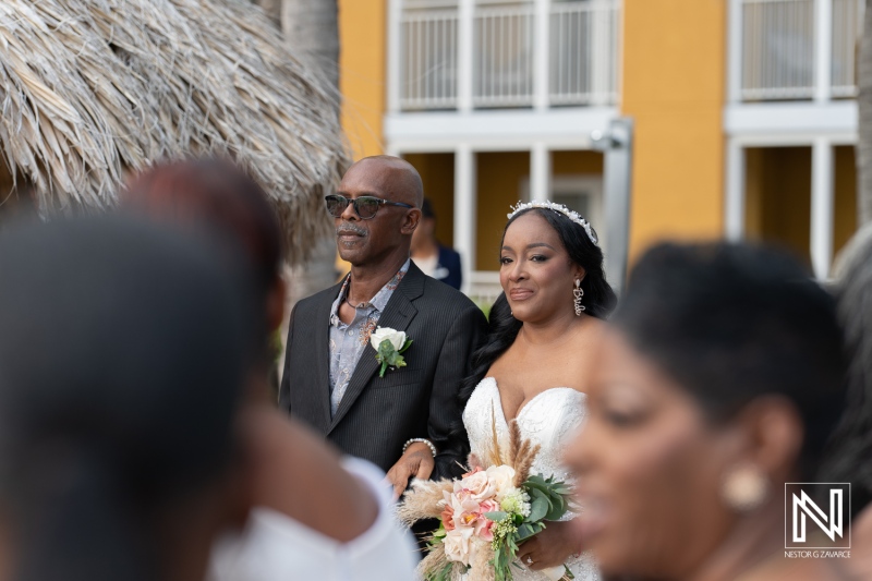 Beautiful wedding ceremony in Curacao at Renaissance Wind Creek Resort under bright sunlight