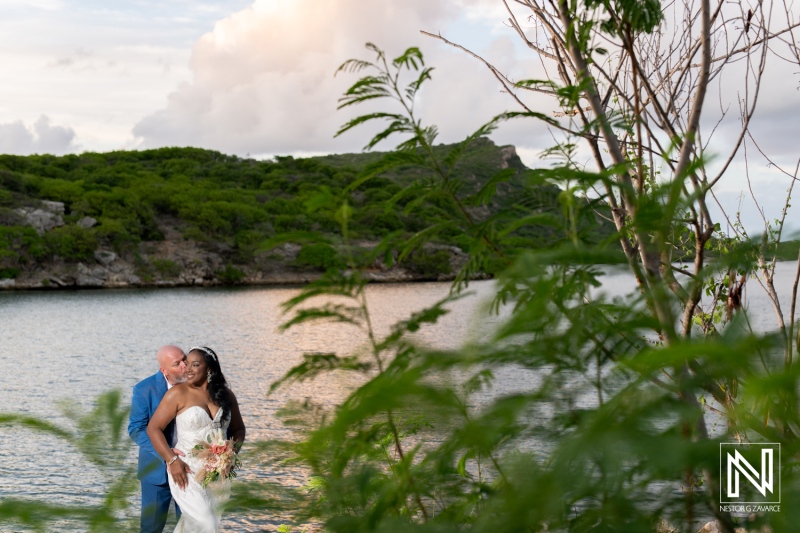 Wedding celebration by the serene waters in Curacao at Renaissance Wind Creek resort