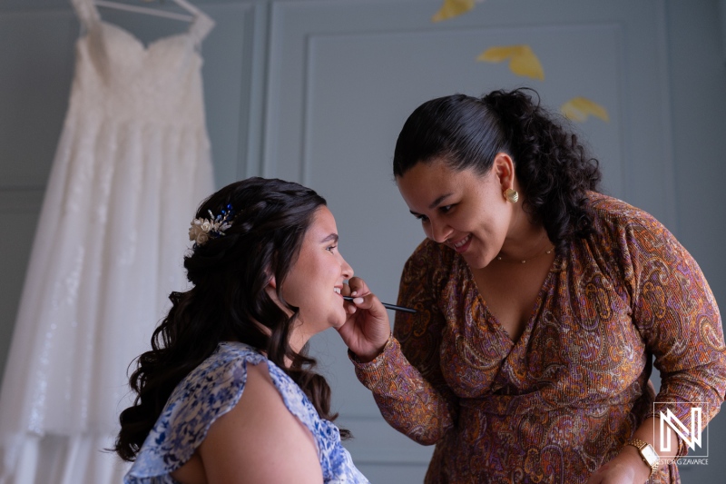 Bride getting ready for wedding ceremony at Renaissance Wind Creek Curacao Resort on a beautiful sunny day