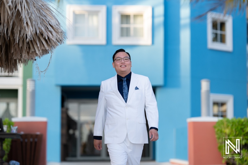 Wedding ceremony at Renaissance Wind Creek Curacao Resort showcases a joyful groom ready for the celebration