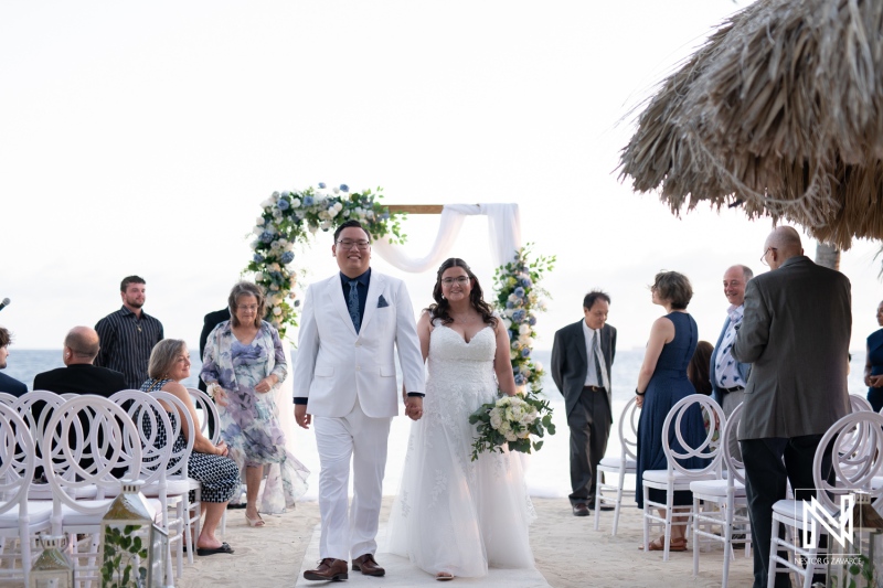 Celebrating a beautiful wedding ceremony at Renaissance Wind Creek Curacao Resort with joy and elegance on the beach