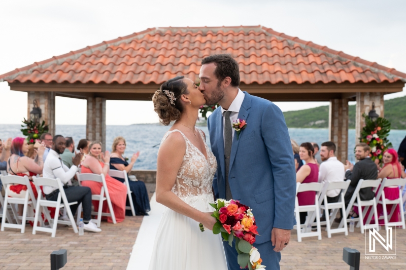 Couple walking out the isle