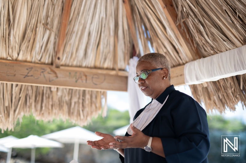 Ceremony for a wedding at Daaibooi Beach, Curacao, highlighting heartfelt moments and shared emotions