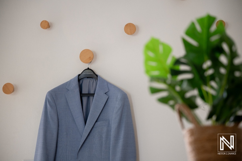 Wedding events take place at Playa Hunku in Curacao with a focus on preparation and attire