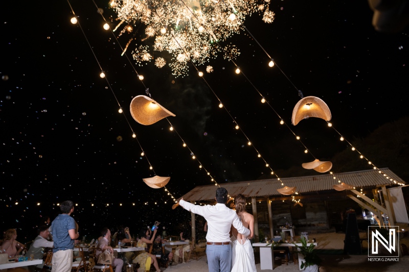 Wedding celebration at Playa Hunku in Curacao with fireworks and decorations in the evening