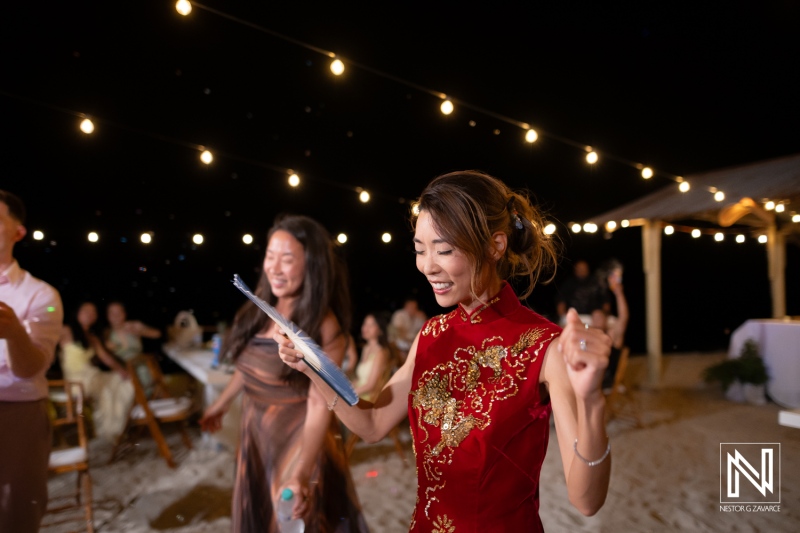 Celebration at Playa Hunku for a wedding in Curacao with guests enjoying the night
