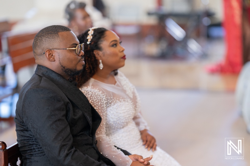 Moments of reflection during a wedding ceremony in Curacao, showcasing love and elegance amidst a beautiful setting